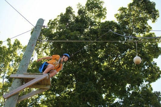 A student on the ropes course at Hyde School